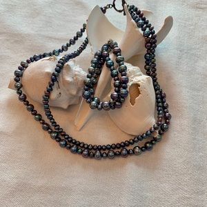 Fresh water pearl necklace and bracelet.